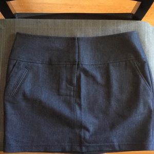 Blue mini skirt with three clasp closure